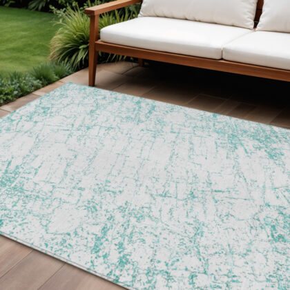 10' X 14' Teal Blue And Ivory Abstract Washable Indoor Outdoor Area Rug