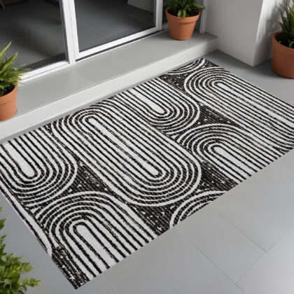 2' X 3' Black and White Abstract Washable Non Skid Indoor Outdoor Area Rug