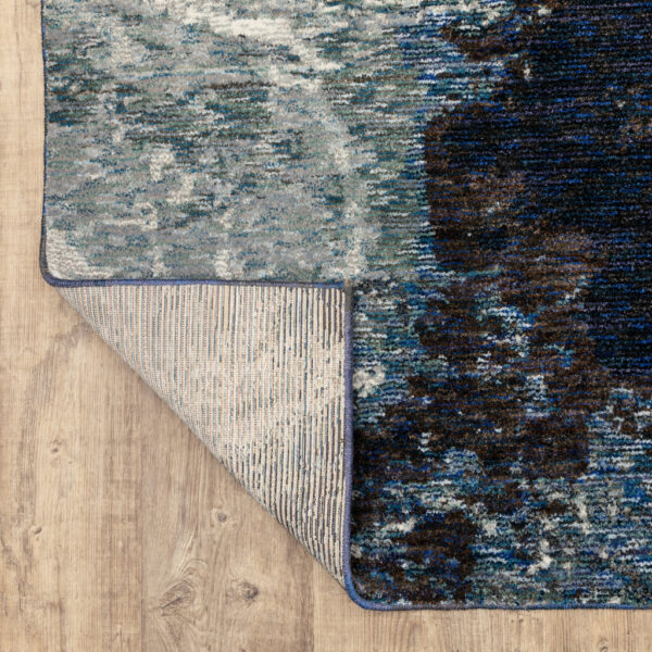 5' X 7' Grey Teal And Green Abstract Power Loom Stain Resistant Area Rug