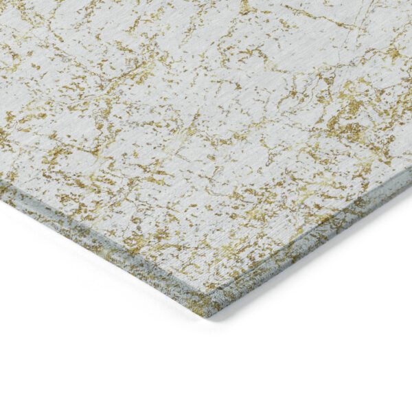 3' X 5' Gold And Ivory Abstract Washable Indoor Outdoor Area Rug