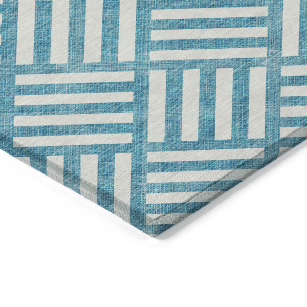 3' X 5' Teal Blue And Ivory Geometric Washable Indoor Outdoor Area Rug