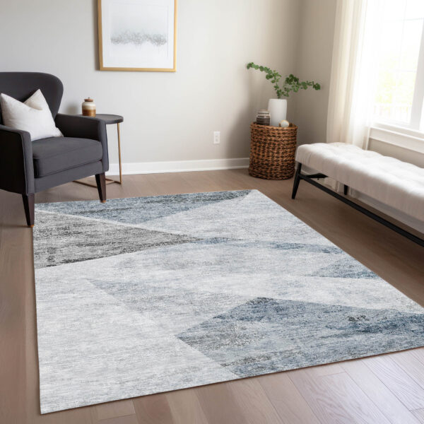 9' X 12' Sky Blue Gray And Charcoal Abstract Washable Indoor Outdoor Area Rug