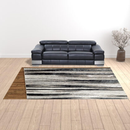 10' x 13' Beige and Black Abstract Power Loom Area Rug