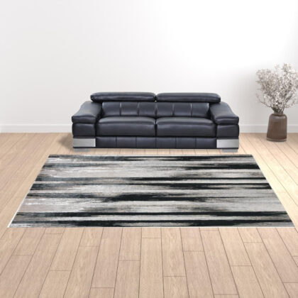 10' x 13' Beige and Black Abstract Power Loom Area Rug