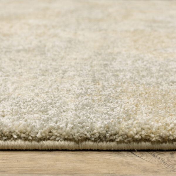 10' X 13' Grey Ivory Beige And Taupe Abstract Power Loom Stain Resistant Area Rug