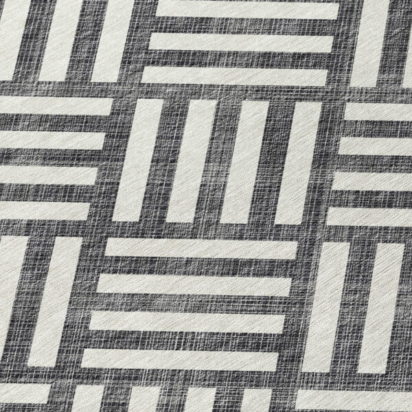8' Black And Ivory Round Geometric Washable Indoor Outdoor Area Rug