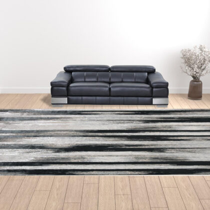 13' x 20' Beige and Black Abstract Power Loom Area Rug