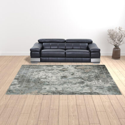 10' X 13' Ivory Grey Charcoal Blue And Rust Oriental Power Loom Stain Resistant Area Rug