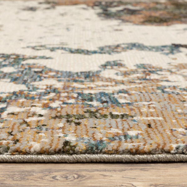 5' X 7' Green Gold And Blue Abstract Power Loom Stain Resistant Area Rug