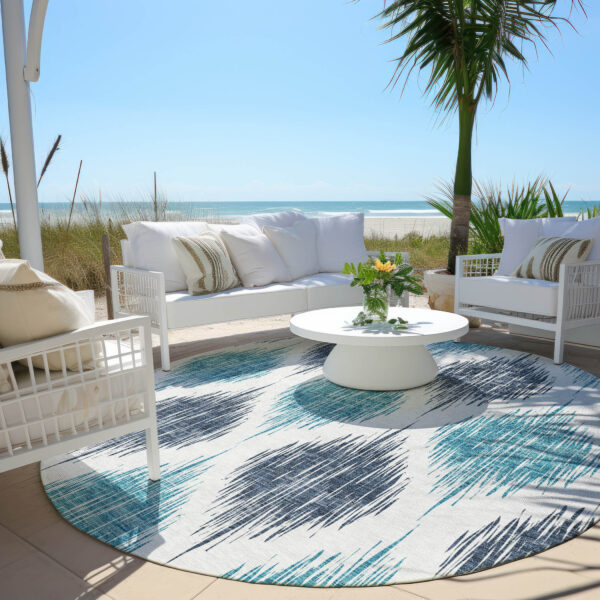 8' Teal Blue And Ivory Round Ikat Washable Indoor Outdoor Area Rug