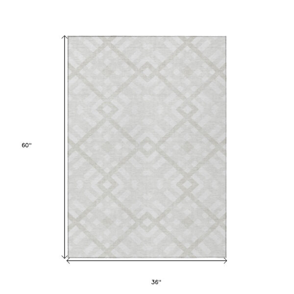 3' X 5' Ivory Beige And Tan Geometric Washable Indoor Outdoor Area Rug