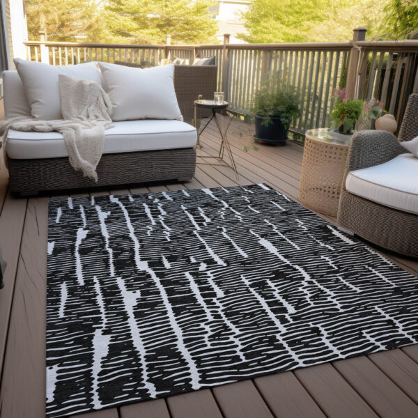 9' X 12' Black And Ivory Abstract Washable Indoor Outdoor Area Rug