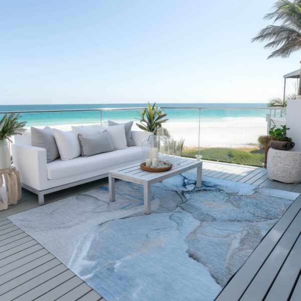 9' X 12' Blue and Ivory Abstract Washable Non Skid Indoor Outdoor Area Rug
