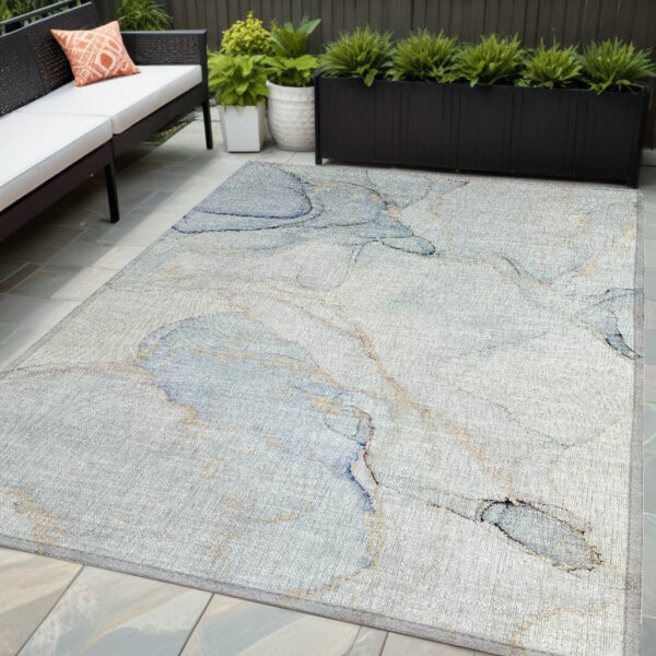5' X 8' Beige and Blue Abstract Washable Non Skid Indoor Outdoor Area Rug