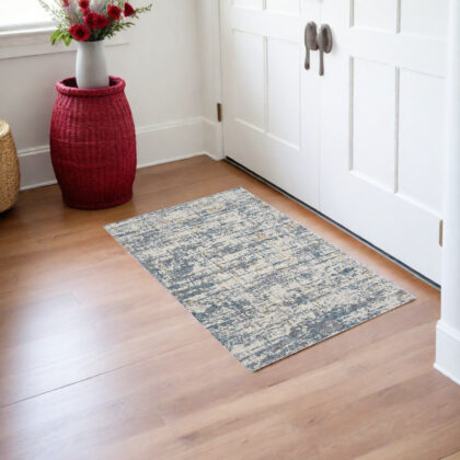 2' x 3' Blue and Ivory Abstract Area Rug