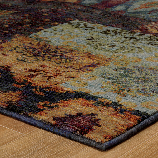 6' X 9' Gold Blue Purple Green And Red Abstract Power Loom Stain Resistant Area Rug