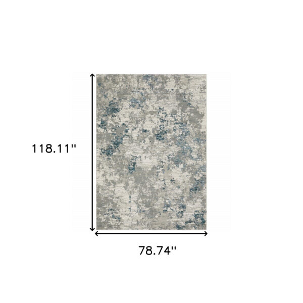 6' X 9' Blue Beige And Teal Abstract Power Loom Stain Resistant Area Rug