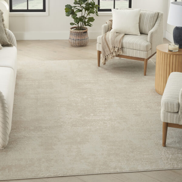 5' x 7' Cream Abstract Area Rug