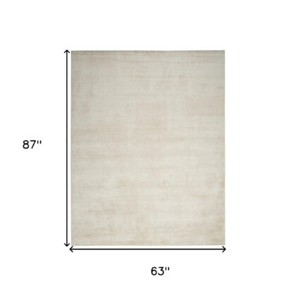 5' x 7' Cream Abstract Area Rug