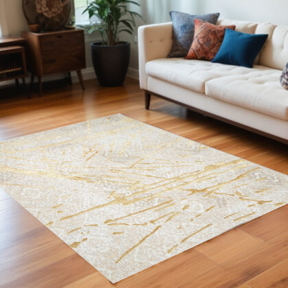 5' x 8' Ivory and Gold Abstract Area Rug