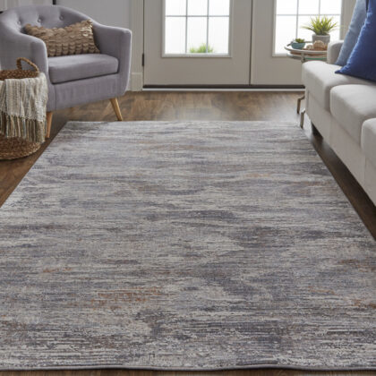 8' X 10' Taupe Tan And Orange Abstract Power Loom Distressed Stain Resistant Area Rug
