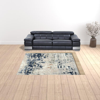 7' X 9' Beige Cream Blue And Gray Abstract Stain Resistant Area Rug