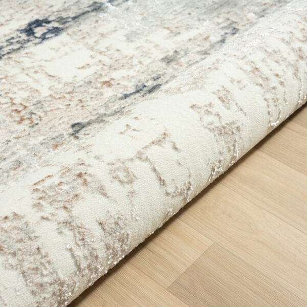 7' X 9' Beige Cream Blue And Gray Abstract Stain Resistant Area Rug