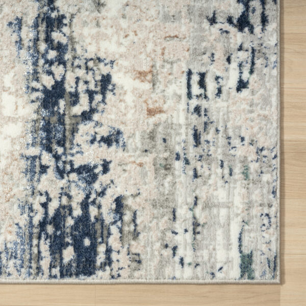 7' X 9' Beige Cream Blue And Gray Abstract Stain Resistant Area Rug