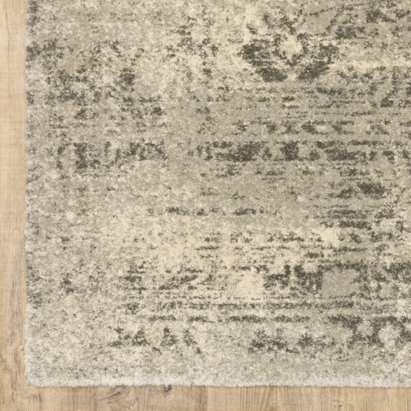 6' X 9' Grey Ivory Beige And Taupe Oriental Power Loom Stain Resistant Area Rug