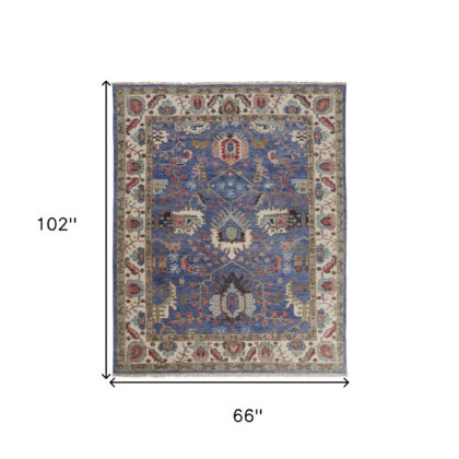 5' X 8' Blue And Red Wool Floral Hand Knotted Stain Resistant Area Rug