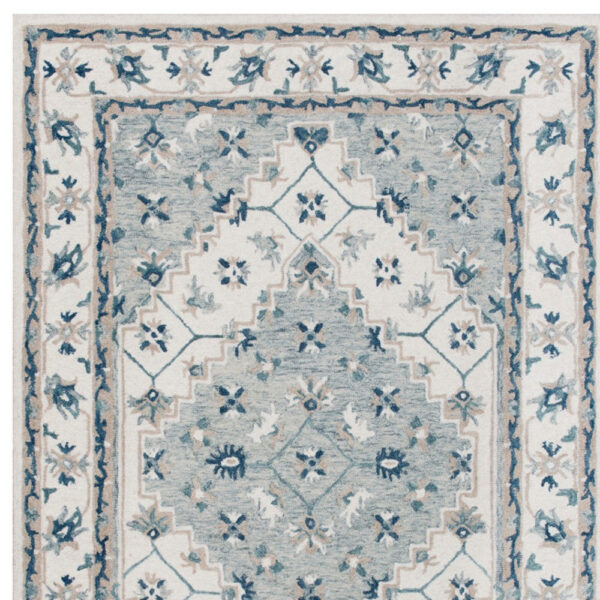 9' x 12' Blue and Ivory Wool Floral Hand Tufted Area Rug