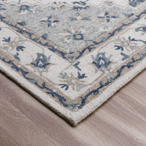 9' x 12' Blue and Ivory Wool Floral Hand Tufted Area Rug