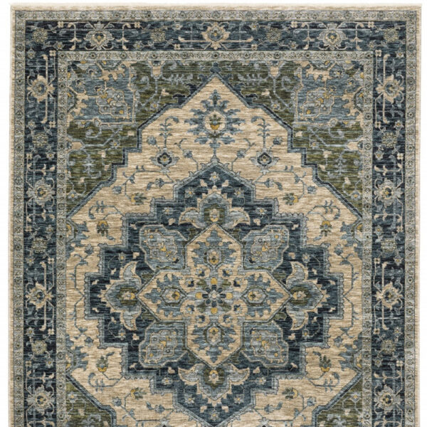 2' X 3' Blue Grey Beige Tan Green And Gold Oriental Power Loom Stain Resistant Area Rug With Fringe