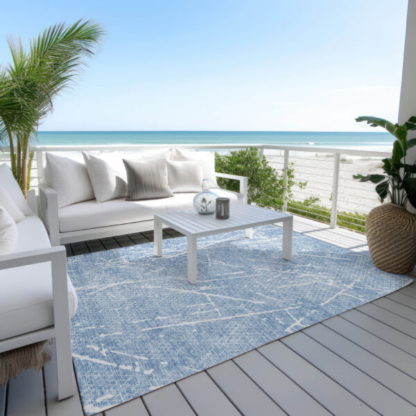 5' X 8' Blue And Ivory Abstract Washable Indoor Outdoor Area Rug