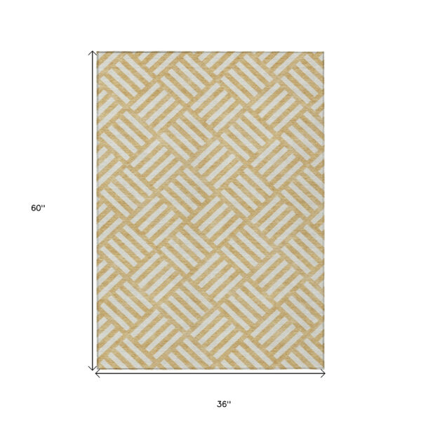 3' X 5' Gold And Ivory Geometric Washable Indoor Outdoor Area Rug