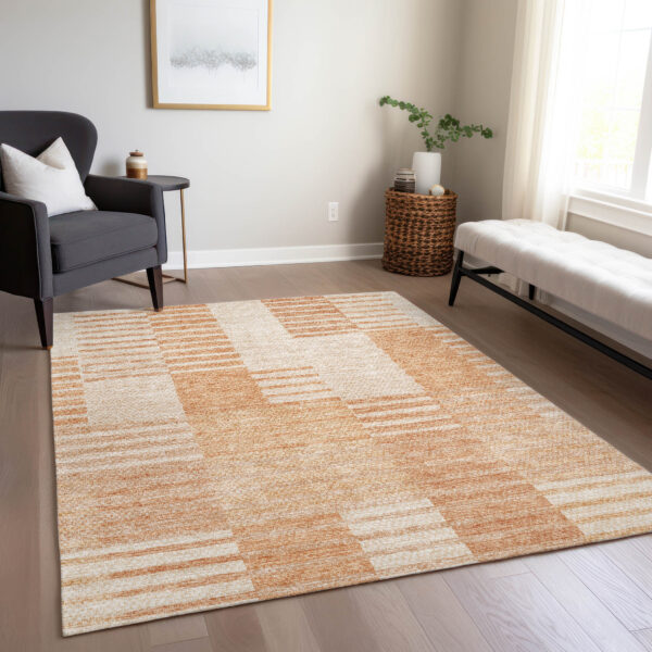 5' X 8' Salmon Peach And Ivory Striped Washable Indoor Outdoor Area Rug