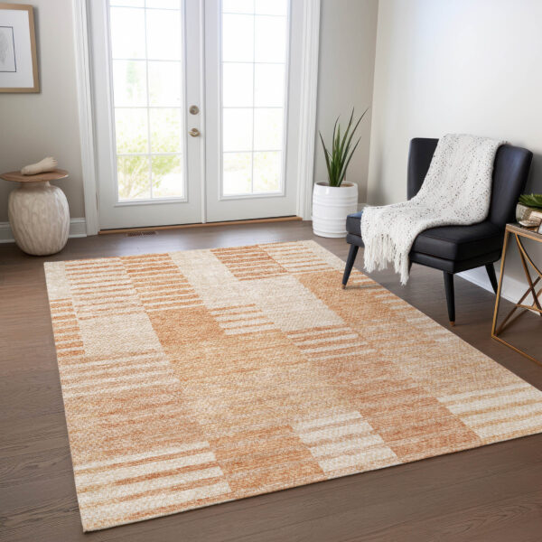 5' X 8' Salmon Peach And Ivory Striped Washable Indoor Outdoor Area Rug