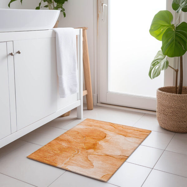 2' X 3' Orange Abstract Washable Non Skid Indoor Outdoor Area Rug
