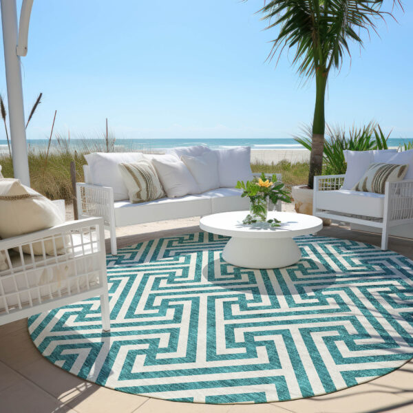 8' Teal Blue And Ivory Round Geometric Washable Indoor Outdoor Area Rug