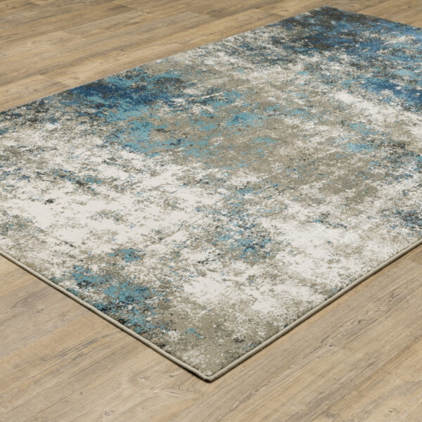 10' X 13' Blue Grey And Beige Abstract Power Loom Stain Resistant Area Rug