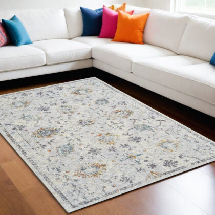 9' x 12' Ivory and Blue Floral Area Rug