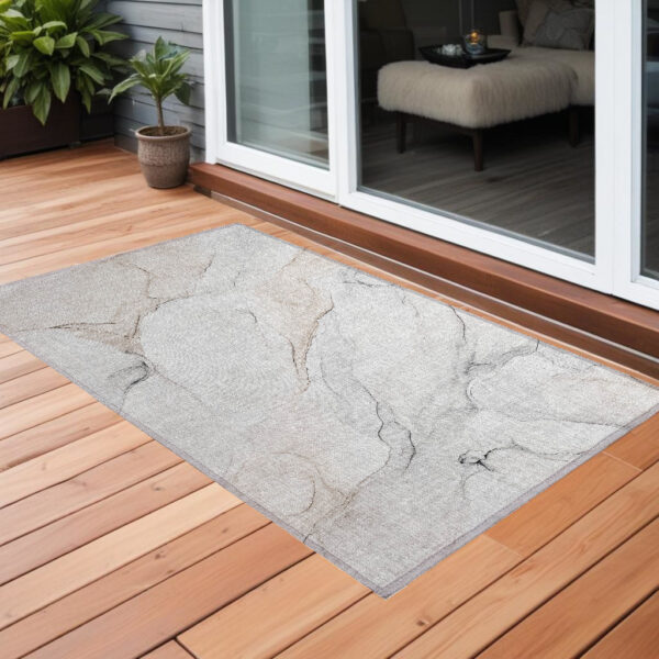 3' X 5' Beige Ivory and Gray Abstract Washable Non Skid Indoor Outdoor Area Rug