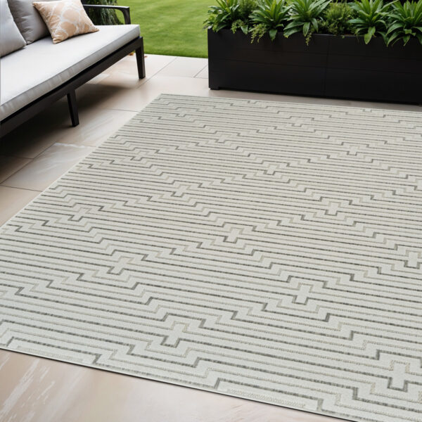 5' X 7' Cream and Beige Geometric Distressed Indoor Outdoor Area Rug