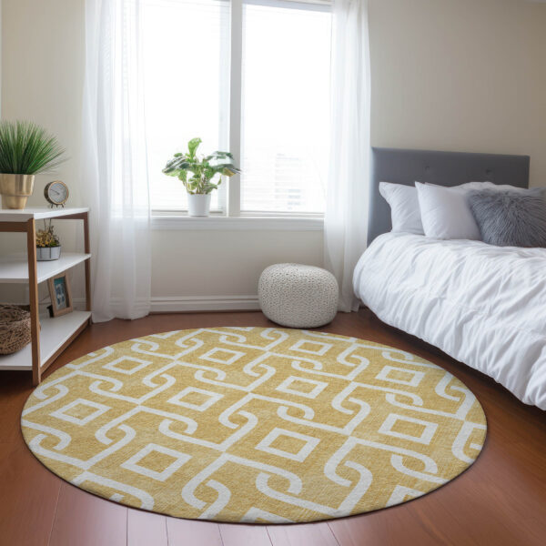 8' Gold And Ivory Round Geometric Washable Indoor Outdoor Area Rug