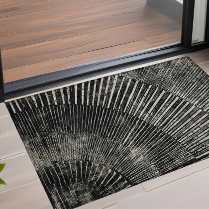 3' X 5' Black and Ivory Abstract Washable Non Skid Indoor Outdoor Area Rug