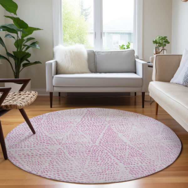 8' Pink And Ivory Round Geometric Washable Indoor Outdoor Area Rug