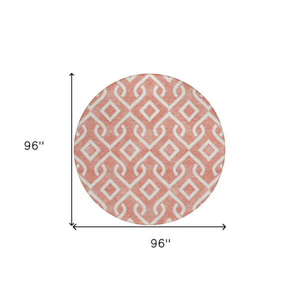 8' Salmon And Ivory Round Geometric Washable Indoor Outdoor Area Rug