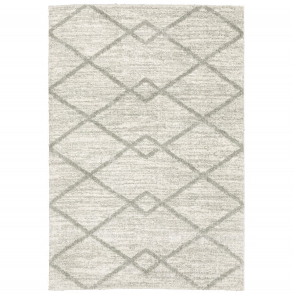 6' X 9' Ivory And Grey Geometric Shag Power Loom Stain Resistant Area Rug
