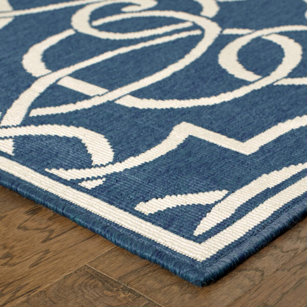 9' X 13' Blue and Ivory Geometric Stain Resistant Indoor Outdoor Area Rug