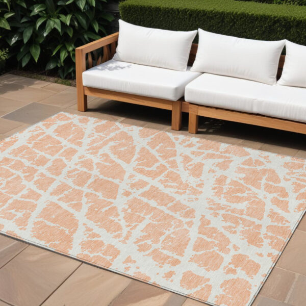 10' X 14' Peach and Ivory Abstract Washable Non Skid Indoor Outdoor Area Rug